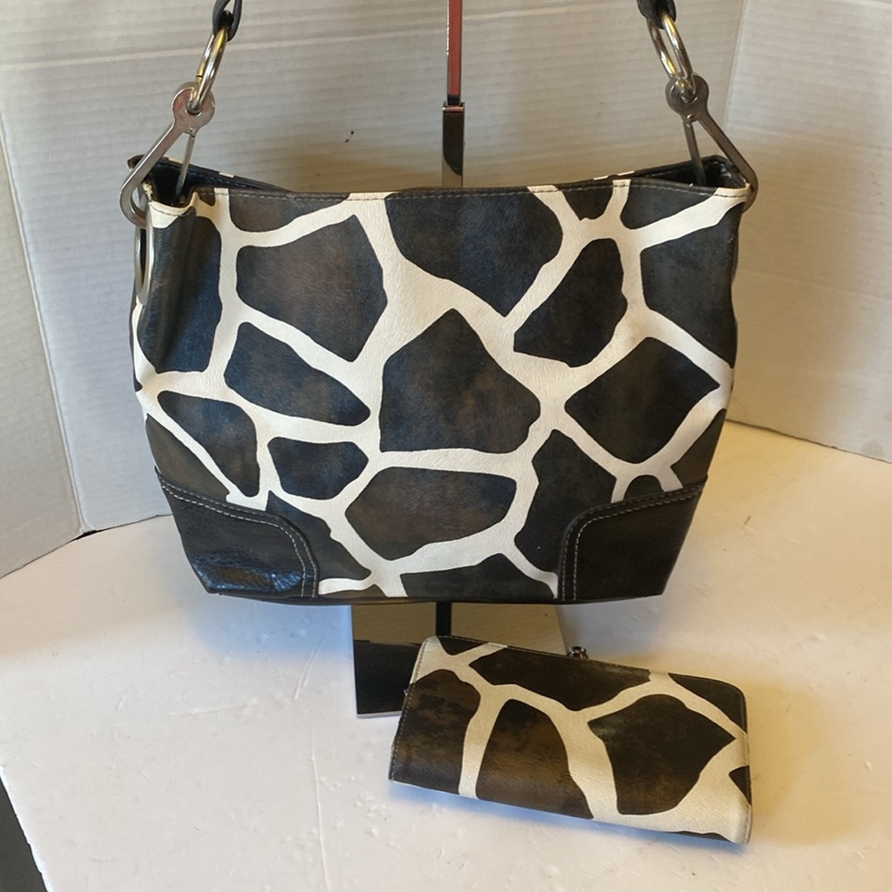 VGUC. Bueno, black and white cow print shoulder bag & matching wallet